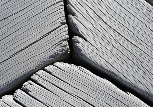 Bleached weathered wood texture abstract background with geometric plank pattern photo