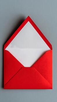 Bright Red Envelope With Open Flap and White Interior on Muted Background photo