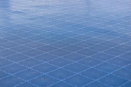 Vibrant blue textured surface displaying an intricate diamond grid pattern with fine vertical lines, creating a dynamic abstract background for modern digital design projects photo