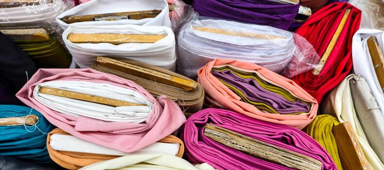 photo of a pile of fabric materials in a store