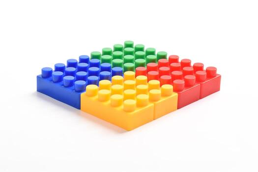 Colorful interlocking building blocks arranged in a square formation on a white background. photo