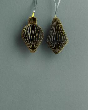 Minimal Top view dark green Christmas paper flashlights on grey background, copy space, desaturated color tree toy with Golden glitters. Merry Christmas and New year holidays, winter festive card photo