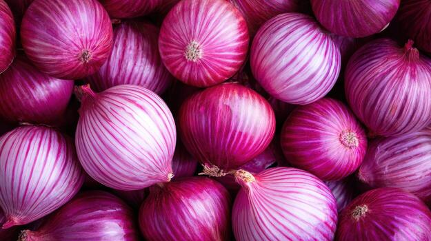 a close up of a bunch of red onions photo