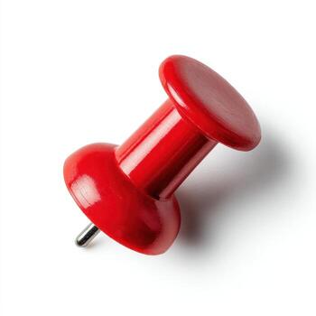 Close up red push pin isolated on white background photo