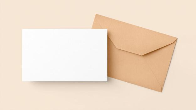 Blank card and envelope on light background photo
