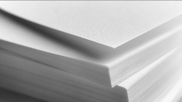 a stack of white paper with a copy of the paper photo