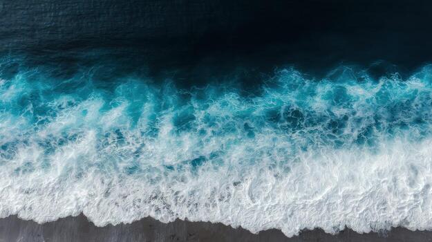Aerial view of ocean waves crashing on dark coastline photo