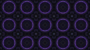 sömlös kalejdoskop animering med lysande lila, blå, och grön fraktal mönster. abstrakt symmetrisk digital bakgrund för vj slingor, musik bilder, och trogen rörelse design video