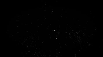 des étincelles de une feu, un abstrait Contexte de croquant blanc particules cette développer et dérive près le foncé vide espace. idéal pour minimaliste, méditatif ou sophistiqué l'image de marque thèmes video