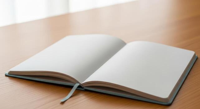 An open book on a wooden table photo