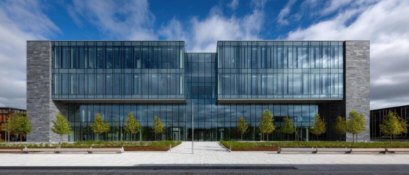 Modern architectural design featuring a large glass building in a landscaped area photo