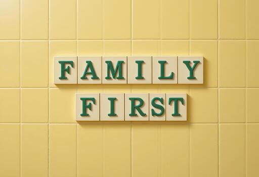 Family First Message on Colorful Wall with Letter Blocks and Yellow Background photo
