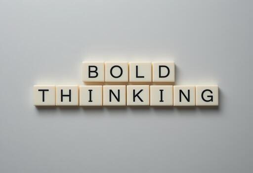 Bold Thinking Concept with Alphabet Tiles on a Minimalist Background photo