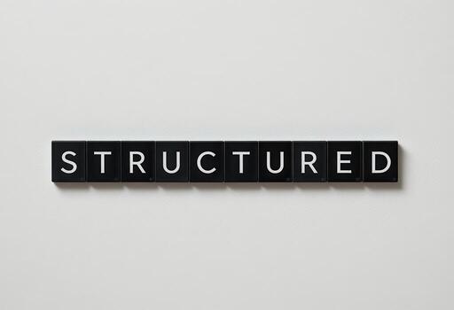 Structured Alphabet Tiles Arranged on a Plain Background for Creative Use photo