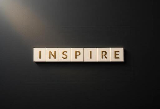 Inspire Motivational Concept with Wooden Blocks on Dark Background photo