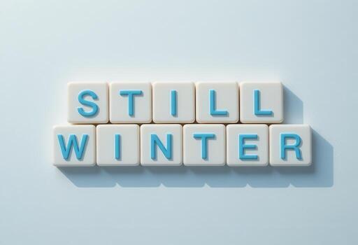 Creative Typography Displaying Message Still Winter on Light Background photo