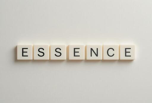 Letters Forming the Word Essence on Light Background for Creative Projects photo