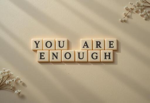 Inspirational Message of Self-Affirmation with Letter Tiles on Surface photo