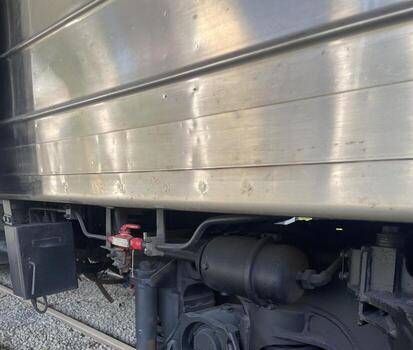A close up of a train engine with a red light photo
