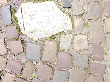 Cobblestones Create a Charming Path in the Old Town Highlighting Historic Charm and Character photo