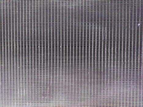 Textured Grid Surface Background With a Soft Filter Effect Creating Depth and Visual Interest photo