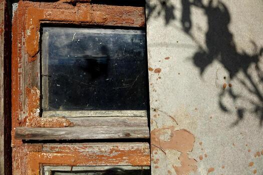 Old Painted Wooden Window With Glass and Textured Background in a Rustic House During the Daytime photo