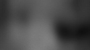Abstract grayscale backdrop showcasing subtle grain and soft, blurred gradients, offering a versatile textured foundation for contemporary digital design and creative projects video
