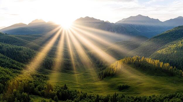 Sunbeams shine over a mountain range with green trees photo