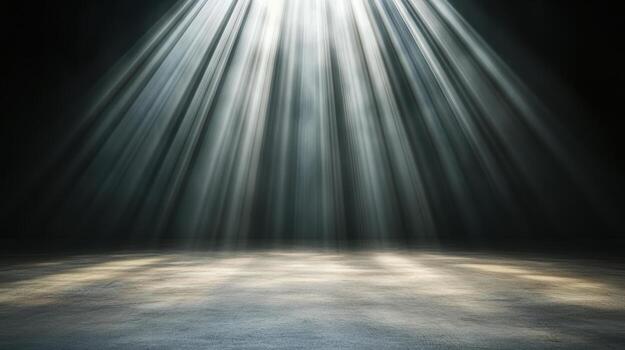 Light beams coming from the ceiling of a dark room photo