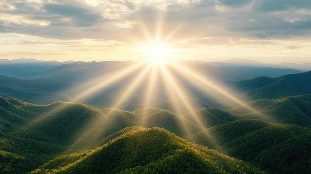 Sunlight shining over a mountain range photo