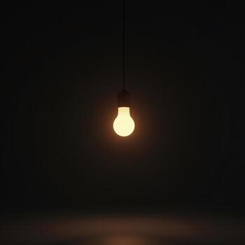 Soft Light from Bulb in Black Space photo