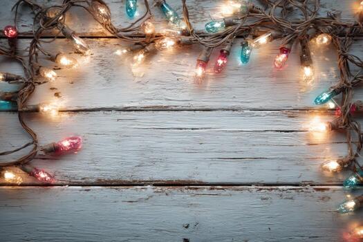 Colorful string lights arranged on a rustic wooden surface create a warm, inviting atmosphere, perfect for festive celebrations and holiday decorations with copy space photo