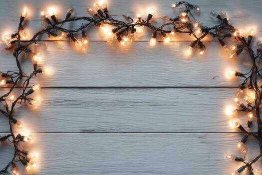 Decorative string lights arranged in a circular pattern on a rustic wooden surface, creating a warm and inviting atmosphere for festive celebrations and gatherings photo