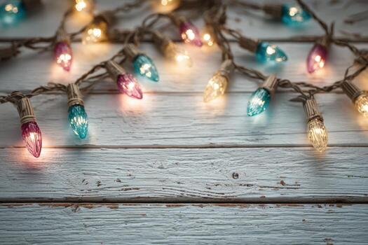 Colorful string lights with warm glow are artistically arranged on a rustic wooden surface, creating a cozy and inviting atmosphere for festive celebrations and gatherings photo