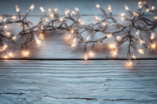 string lights with warm glowing bulbs are elegantly arranged on a rustic wooden surface, creating a cozy and inviting atmosphere for festive celebrations and gatherings photo