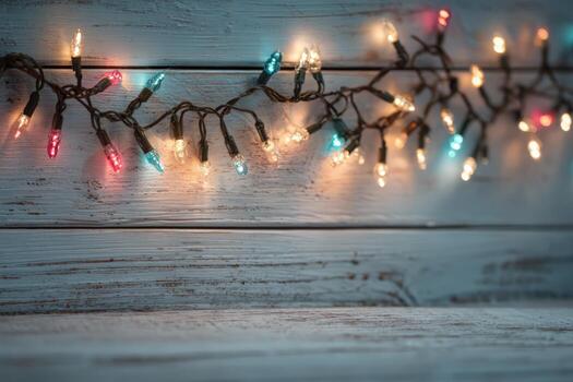 Colorful string lights illuminated against a rustic wooden background, creating a warm and inviting atmosphere, perfect for festive celebrations and cozy gatherings photo