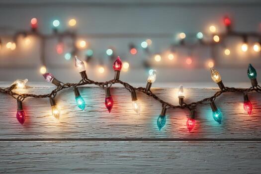Colorful string lights with red, blue, and clear bulbs are beautifully arranged on a rustic wooden surface, creating a warm and festive atmosphere for celebrations and gatherings photo