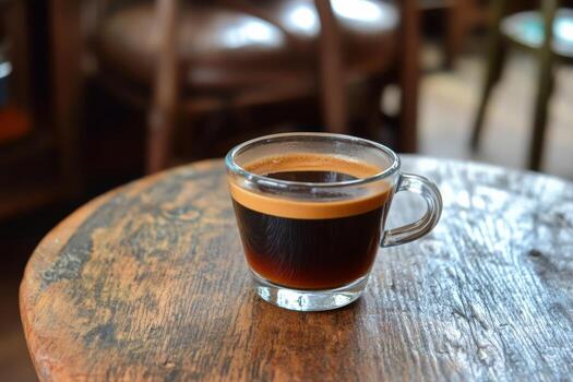 Freshly brewed coffee on rustic wooden table in cozy cafe setting. photo
