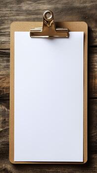 Blank clipboard resting on a wooden table in a bright and organized workspace. photo