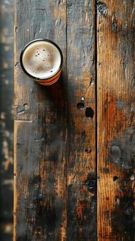 Coffee Resting in a Cup on a Rustic Wooden Table With a Textured Surface in the Morning Light photo