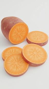 Close-up view of a freshly sliced orange sweet potato with round cuts displayed on a clean and isolated white background for healthy cooking photo