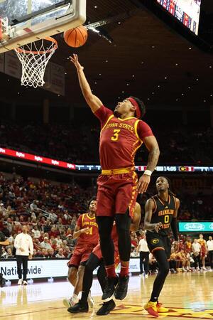Iowa State Cyclones guard Tamin Lipsey (3) scores against the Grambling State Tigers during the first half at James H. Hilton Coliseum. editorial_image