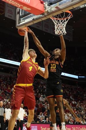 Grambling State Tigers forward Richard Amaefule (10) blocks the shot from Iowa State Cyclones forward Eric Mulder (4) during the first half at James H. Hilton Coliseum. editorial_image