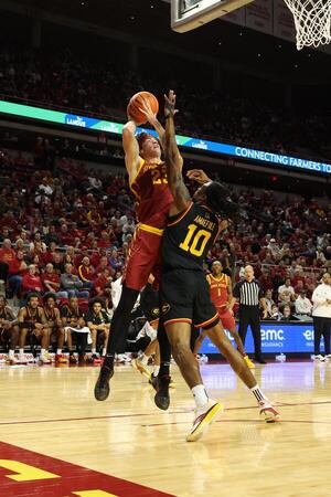 Iowa State Cyclones forward Blake Buchanan (23) is defended by Grambling State Tigers forward Richard Amaefule (10) during the first half at James H. Hilton Coliseum. editorial_image