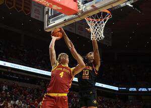 Grambling State Tigers forward Richard Amaefule (10) defends the shot from Iowa State Cyclones forward Eric Mulder (4) during the first half at James H. Hilton Coliseum. editorial_image