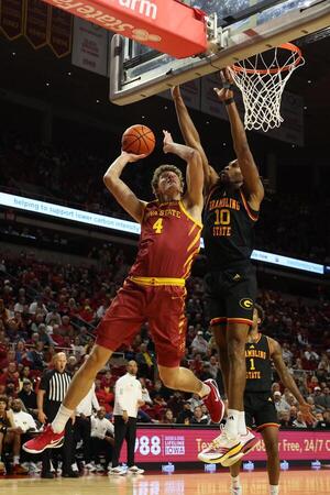 Grambling State Tigers forward Richard Amaefule (10) defends the shot from Iowa State Cyclones forward Eric Mulder (4) during the first half at James H. Hilton Coliseum. editorial_image