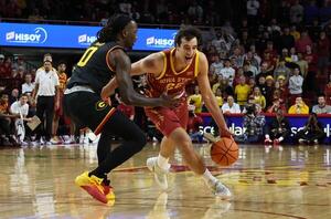 Iowa State Cyclones forward Milan Momcilovic (22) is defended by Grambling State Tigers guard Derrius Ward (0) during the first half at James H. Hilton Coliseum. editorial_image