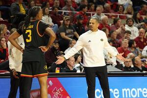 Grambling State Tigers head coach Patrick Crarey II talks with Grambling State Tigers forward Rickey Ballard (3) after he received a technical found in their game with the Iowa State Cyclones during the second half at James H. Hilton Coliseum. editorial_image