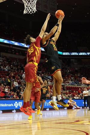 Iowa State Cyclones forward Xzavion Mitchell (55) defends Grambling State Tigers forward Devyn Franklin (21) during the second half at James H. Hilton Coliseum. editorial_image