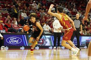 Grambling State Tigers forward Antonio Munoz (15) is defended by Iowa State Cyclones forward Milan Momcilovic (22) during the second half at James H. Hilton Coliseum. editorial_image